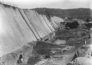 Prints of Harnessing nature to the needs of husbandry. Great engineering feat nearing completion at a cost of over three million 1920s Prints: Harnessing nature to the needs of husbandry. Great engineering feat nearing completion
