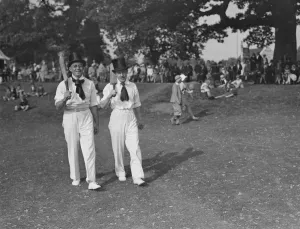 Top hats and side whiskers were worn by players in an old time cricket match between