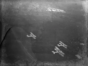 Three De Havilland DH60X moths ( G-aPW, G-aRA, G-AFPY ) performing a dummy air