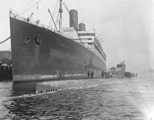 HMS Submarine No 3 The new submersible battleship lying alongside the giant Cunarder