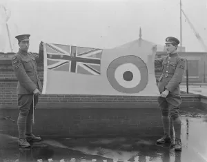Uniform Uniforms Prints: Hoisting the new Royal Air Force ensign. Members of the RAF with the Flag before