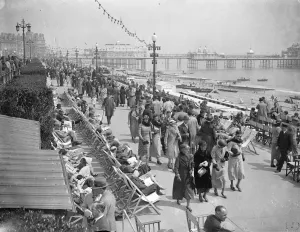 Holiday Crowds Find the Sun at Eastbourne Although London shivered in cold wind