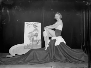Holiday girl comes to life. Film actress rehearses for Dorchester Hotel Ball