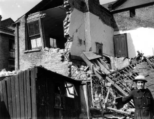 Britain Prints: Home front 1940. Destroyed house lies dormant after German bombers had finished