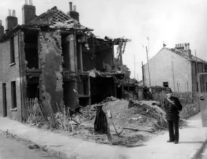 Britain Prints: Home front 1940. An end of terrace house destroyed after a raid on Eltham by German
