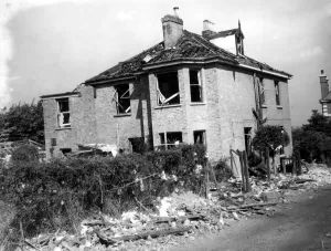 Britain Prints: Home front 1940. A house in the Bexley area, showing considerable damage, surrounded