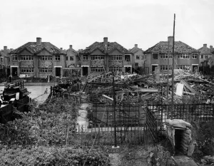 Gardens Prints: Home front 1940. A residential area showing signs of being heavily damaged after