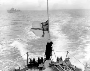 Harbour Prints: Home coming of Unknown Soldiers on H. M. S. Saluting the dead. After a 19-gun salute