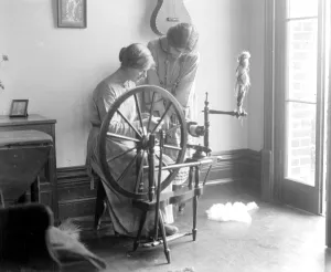 Home dyeing and weaving industry at Alston Studio. Mrs Alston giving a lesson in