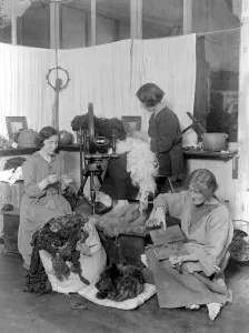 Paddle Prints: Home dyeing and weaving at South Holmwood. Tree process - spinning, Pulling the wool