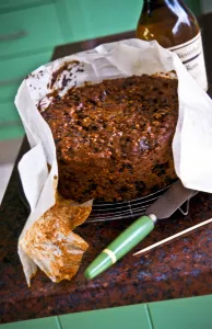 Cooking Prints: Homemade Christmas cake, being unwrapped from its greaseproof paper. credit: Marie-Louise