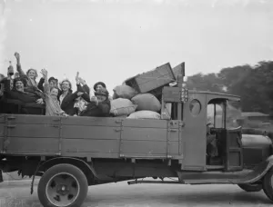 Hops Prints: Hop pickers in East Peckham riding in the back of a truck. 1 September 1938