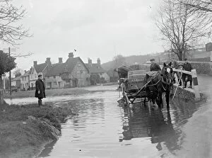 Children Collection: A horse and cart wades throug the ford at Eynsford in Kent watched by schoolboys