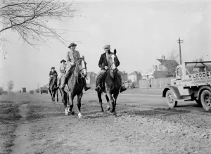 Horse riders on a road in Bexley, London 1938