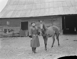 Horse trick riding in Eynsford, Kent. Mr Jorganoff poses with a horse