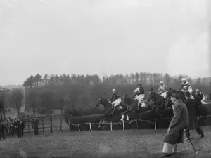 Riders Prints: Horses jumping the fences at the R A Woolwich point to point. 1936