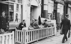 Street Prints: A hot summers day revelas al fresco dining in West End London, England. 15 May 1947
