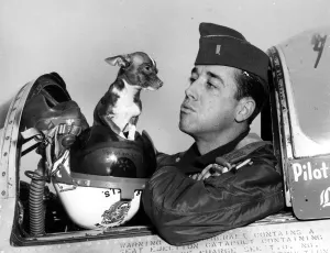 Hows about a little kiss, Chihuahua? First Lt James A Mills, of Charlotte, North