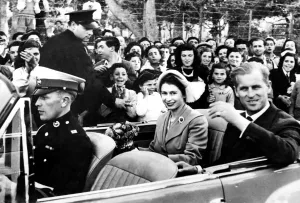 Spectators Prints: HRH Princess Elizabeth and the Duke of Edinburgh acknowledging the cheers of the crowds