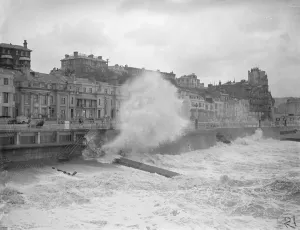 Huge waves broke over the front at Hastings during a Gale, which ravaged the south coast