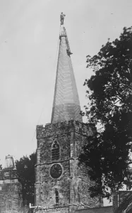 Human Weathercock. Ager the London steeplejack balancing himself on the 150