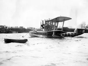 International Herald Tribune Prints: Imperial Airways flying boat Swanage moored at Southampton ready for her flight to