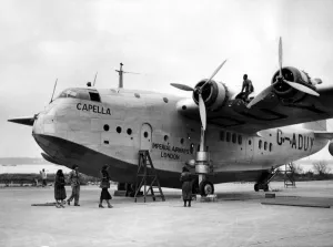 International Herald Tribune Prints: Imperial Airways latest Empire flying boat Capella being prepared at Southampton