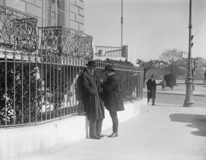 An informal chat at Geneva. Lord Robert Cecil has a talk by the roadside with M