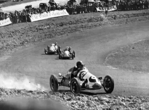 Fifties Prints: International motor racing at Brands Hatch Headland driving his Cooper 9 skidded