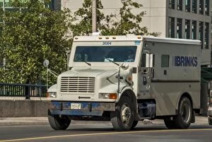 Trucks Collection: An International small 4 wheeled box van, amoured secuity vehicle in downtown toronto