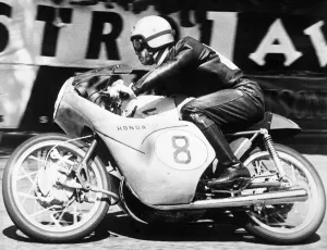 Motorsport TT Race Prints: Isle of Man: Japanese rider Taniguchi on a Honda machine racing round the Manx track