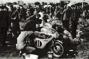 Motor Cycling Prints: Isle of Man: Mechanics at work in the pits ofn the Japanese honda machines before