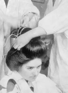 Framed Print : Japanese girls submit to 2 hours agony for alluring coiffure. Few people who admire Framed Print : Japanese girls submit to 2 hours agony for alluring coiffure. Few people who admire