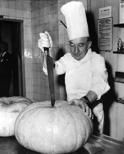 Hallow Prints: Jean Boutheney, a French chef born in Newcastle-upon-Tyne, chops a large pumpkin