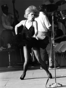 International Herald Tribune Prints: Joey Heatherton, entertains American servicemen with a torrid dance during the troops