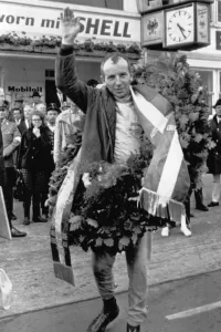 World Champion Prints: John Surtees happy winner of the Nurburgring Grand Prix. It was his first Ferrari win