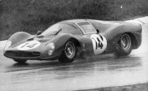 Driver Prints: John Surtees pictured in action in heavy rain at the 1000 km Monza International race