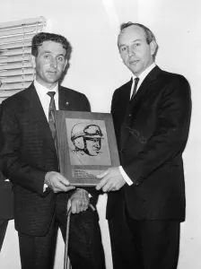 John Surtees (right) the present world champion car racing driver received a special