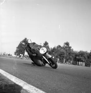 John Surtees rounds a corner at the Italian Grand Prix Surtees won both the 350cc