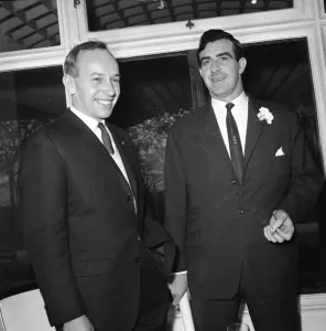 World Champion Prints: John Surtees stands with cricketer Fred Trueman at the Men of the Year luncheon