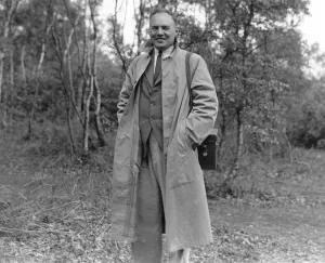 Long Coat Prints: John Topham Portait with camera 1934 A John Topham / TopFoto