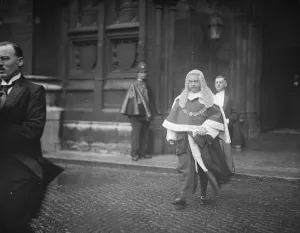 Judges at the abbey. Lord Hewart, the Lord Chief Justice, with his trainbearer