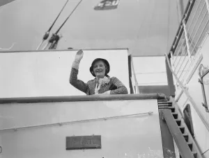 June returns to England. June, the noted actress, who was recently divorced
