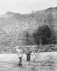 Cross Prints: Kashmir, India A rope bridge across the Jhelum river near Srinagar. The ropes