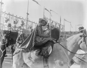 King Carnival at Nice. A carnival figure on horseback. 26 February 1924