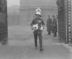King holds an investiture. Colonel Glasgow, who received the CBE, leaving. 6