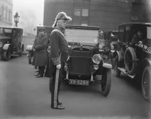 The King holds a levee at St Jamess Palace. Lord Cave leaving after the levee