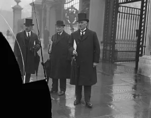 King honours railway men. Mr A Sandilands, L N E R, Mr J Scott, L M S, and Mr R Scorgie