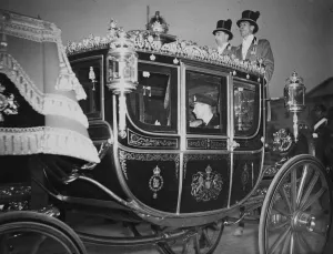 The King and Queen drove in state from Buckingham Palace to the House of Lords for
