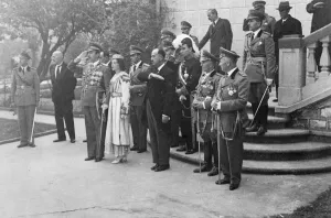 King Zog take salute in peasants celebration parade in Tirana. King Zog I, accompanied